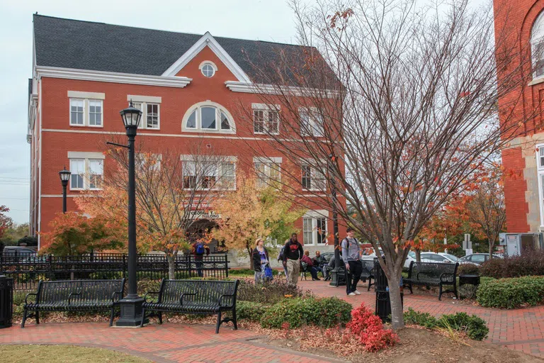 Exterior ob Bagby Building on the Paulding Site. Red brick building with brick path leading to entrance. 