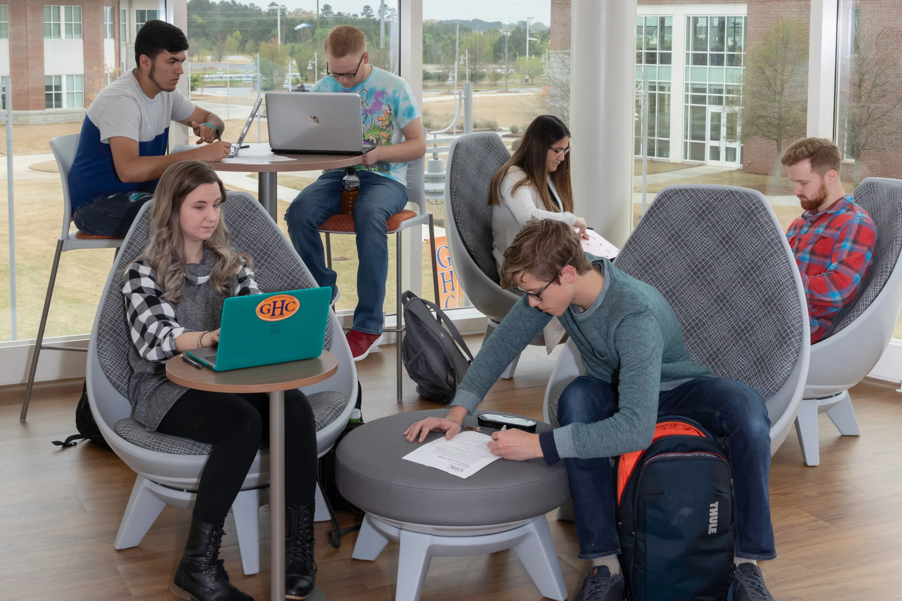 Students gather in the common area on the second floor