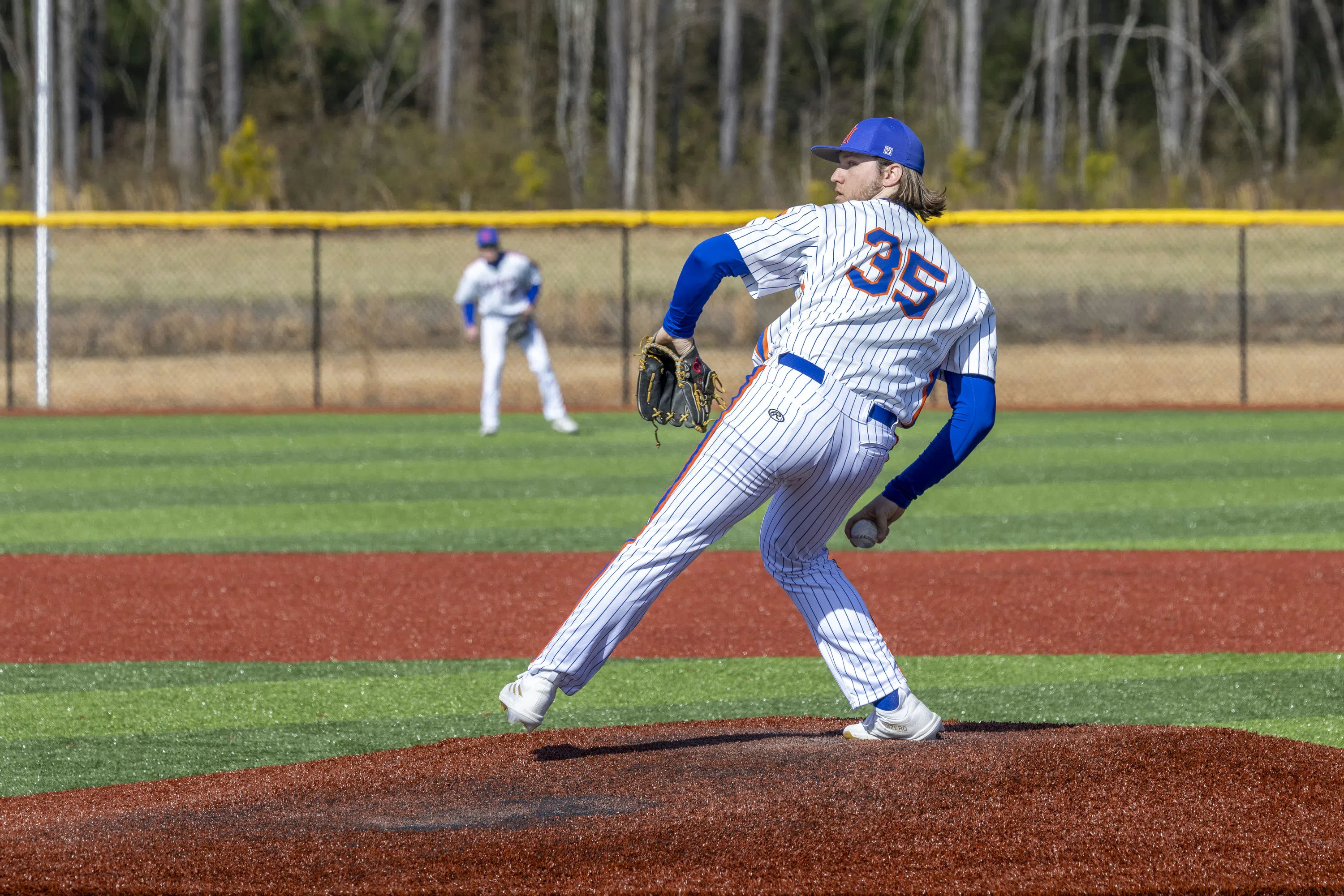 Baseball Player pitching