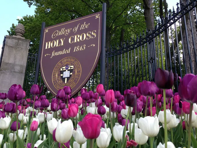 Sign and flowers at front gate