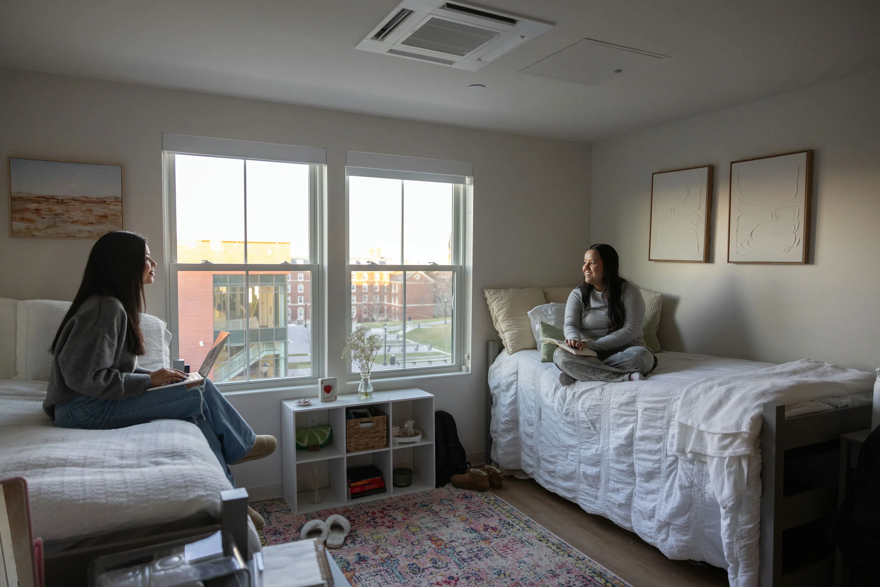 Two students in their townhouse bedroom 