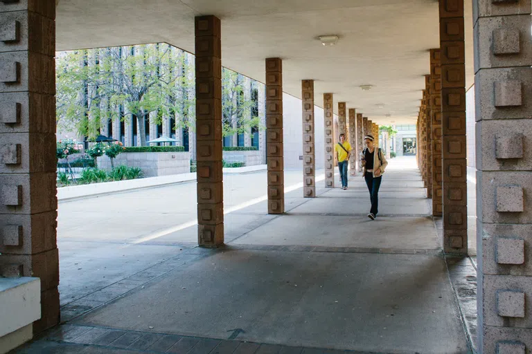 Sprague with students walking