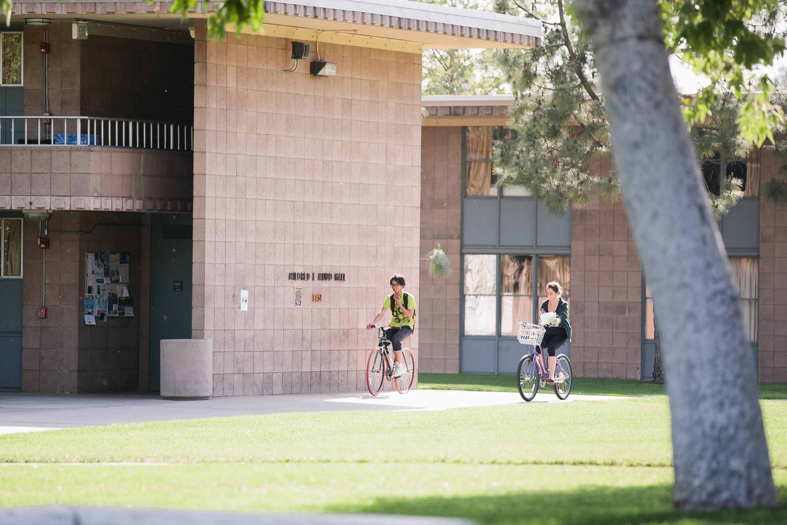 Campus dorm - students on bike