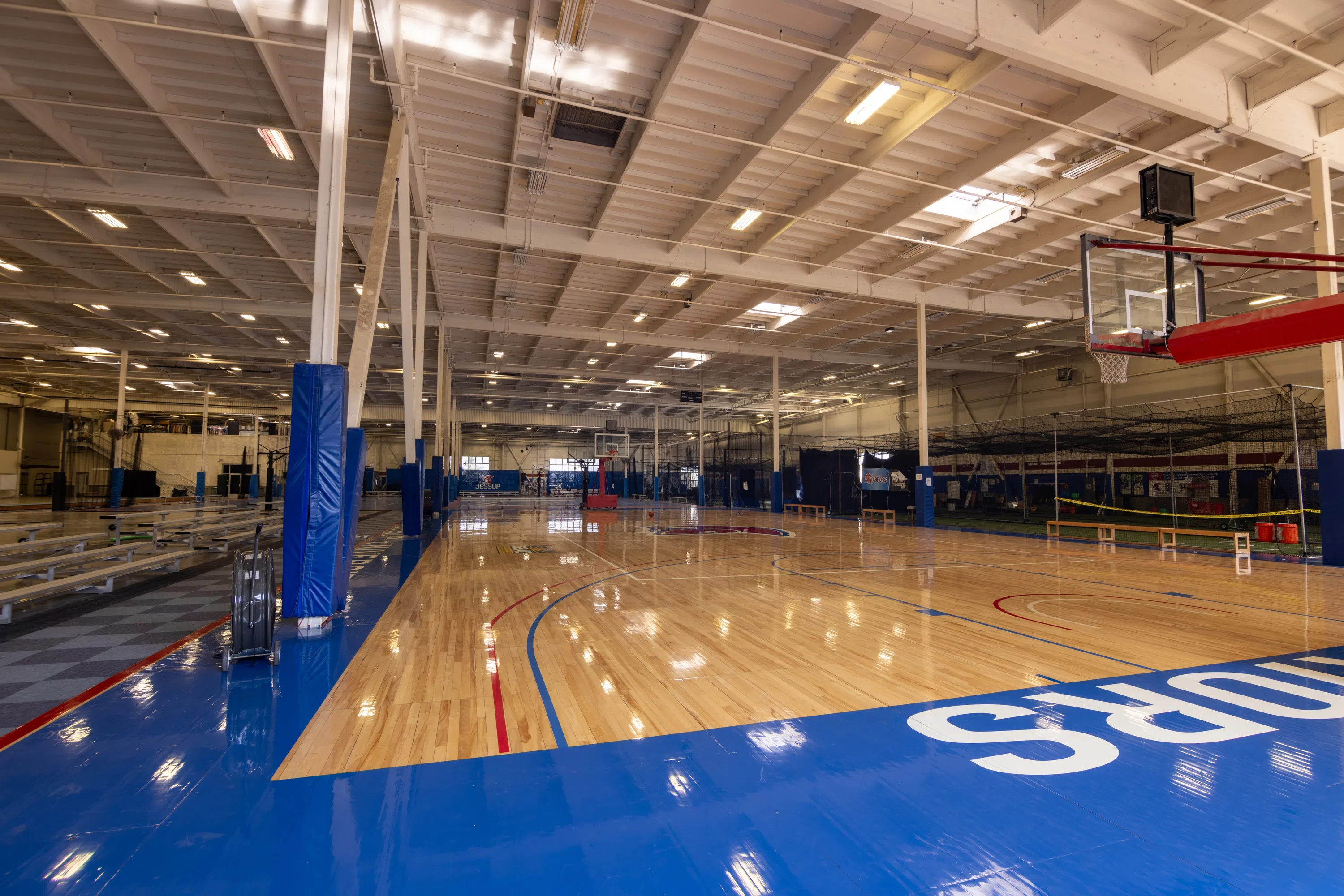 Wide view of multi-purpose interior courts and spectator areas