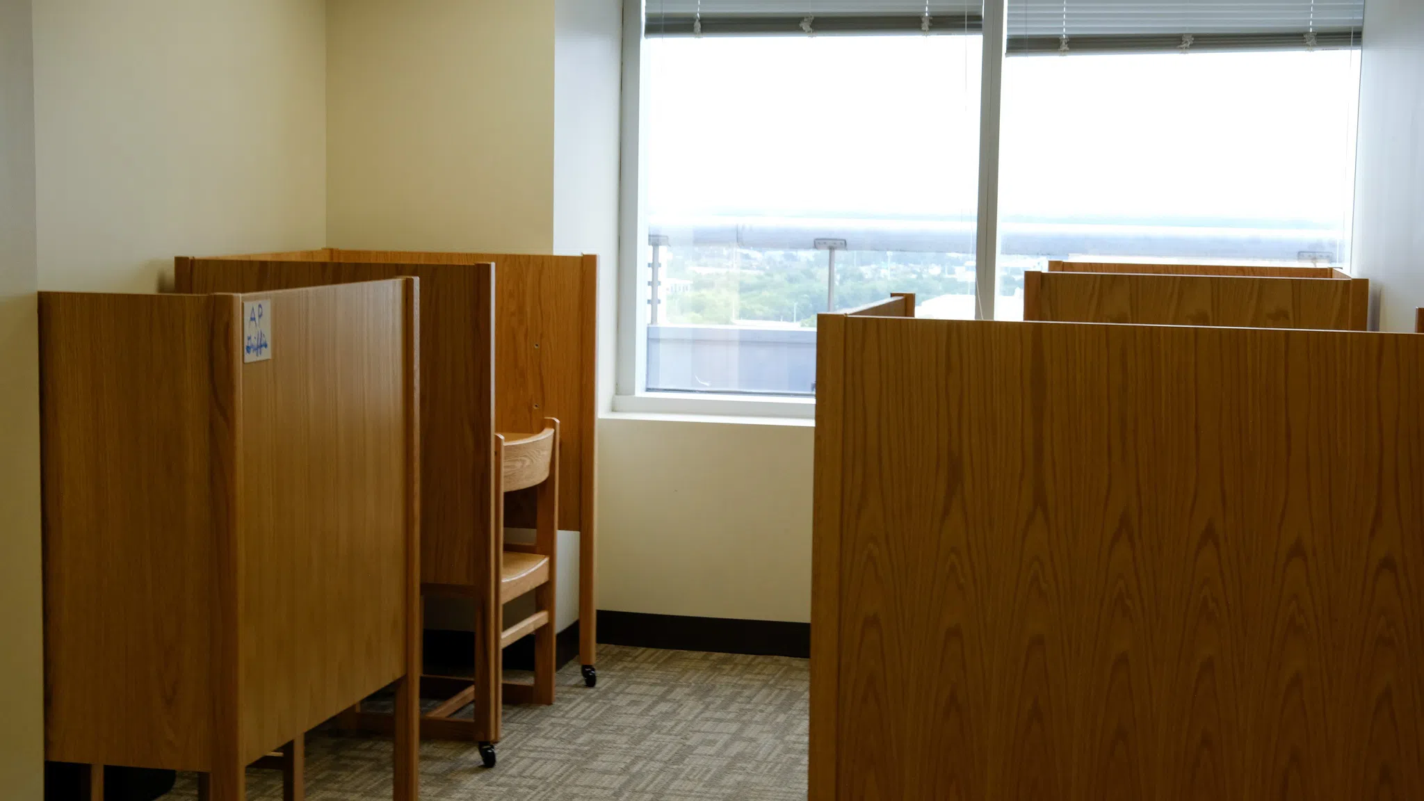 Four study carrels arranged around a window with a view of downtown Jacksonville.