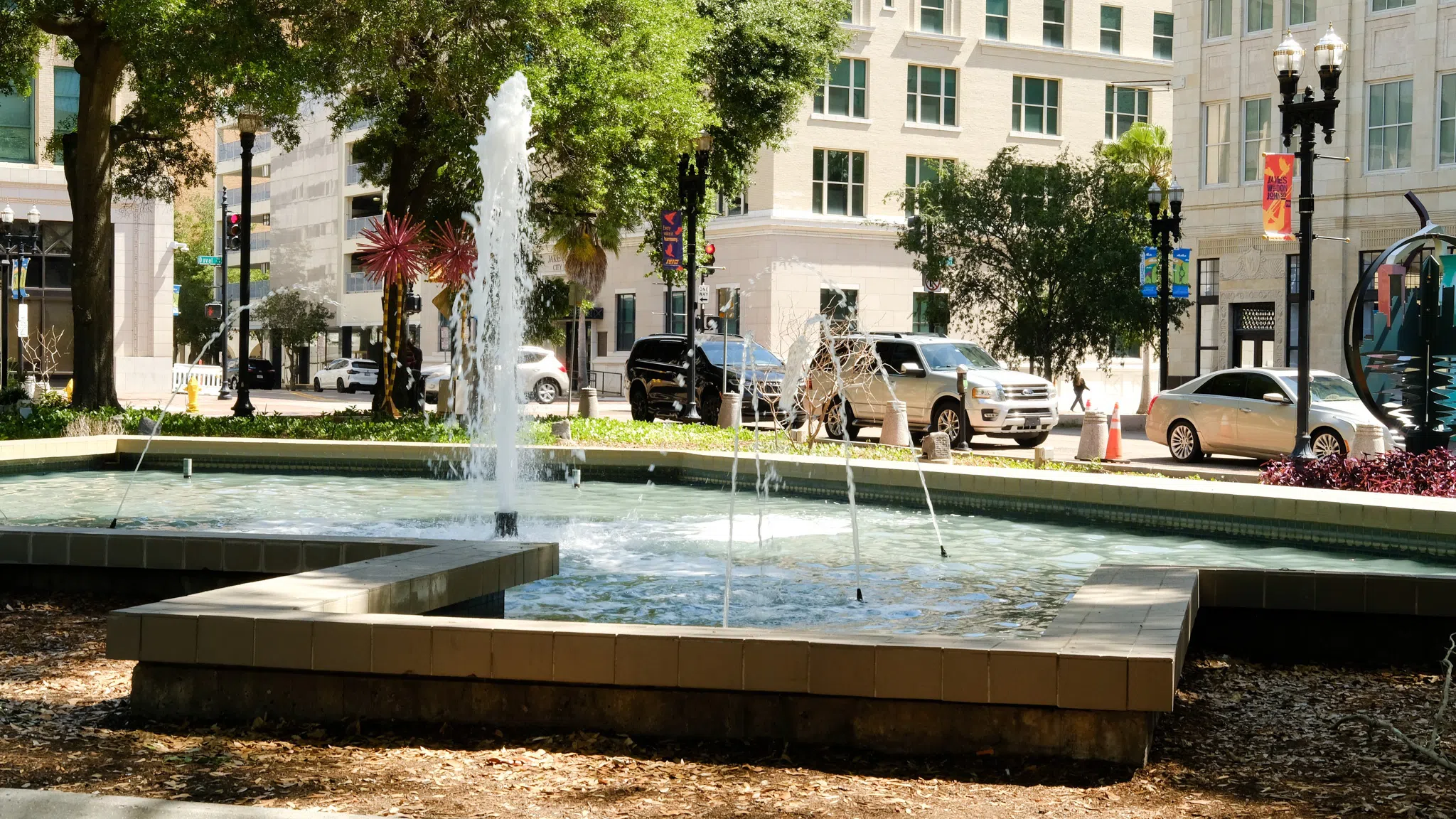 A large fountain situated in the middle of the park.