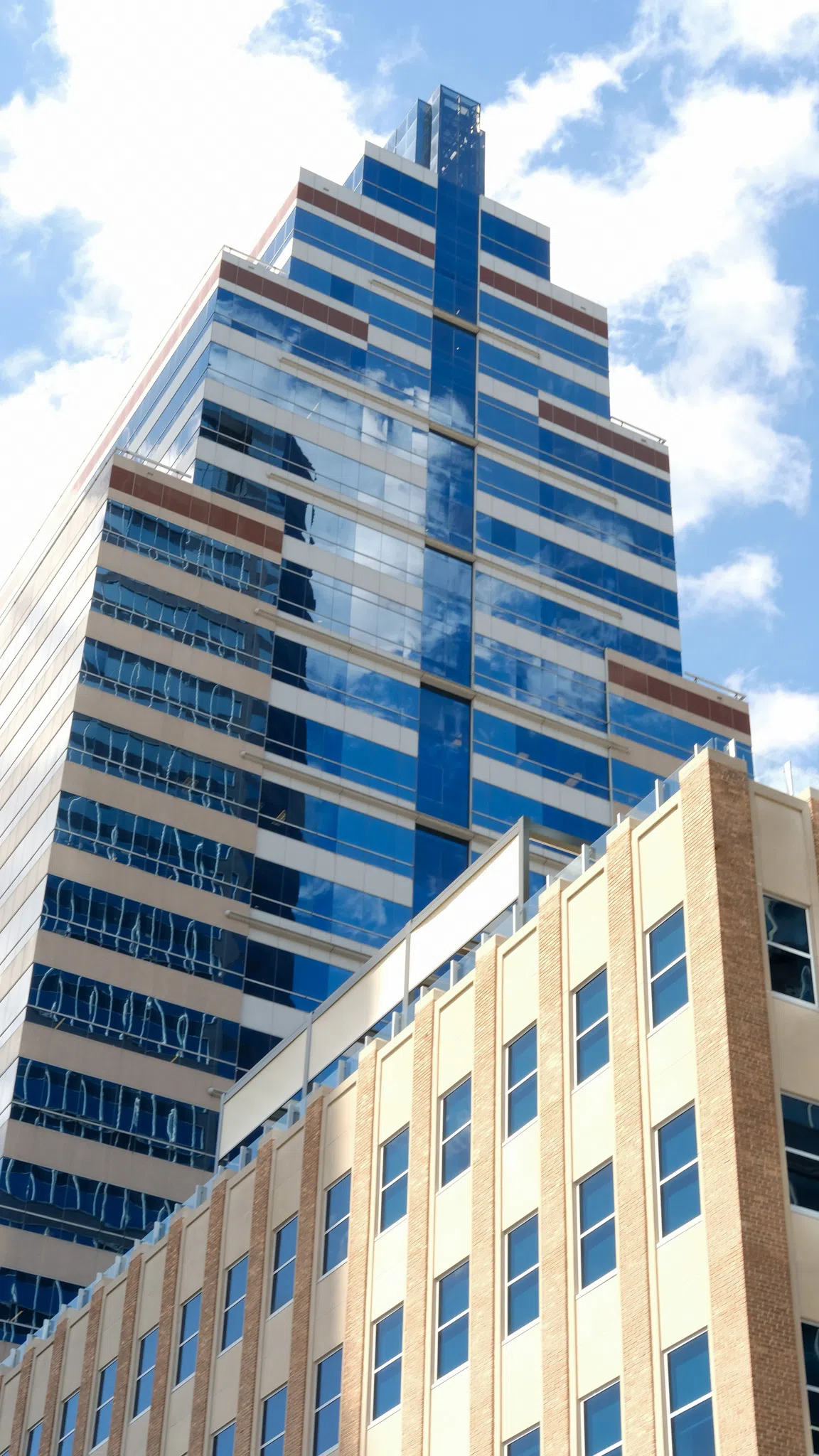 A blue, tower office building located in downtown Jacksonville, Florida.
