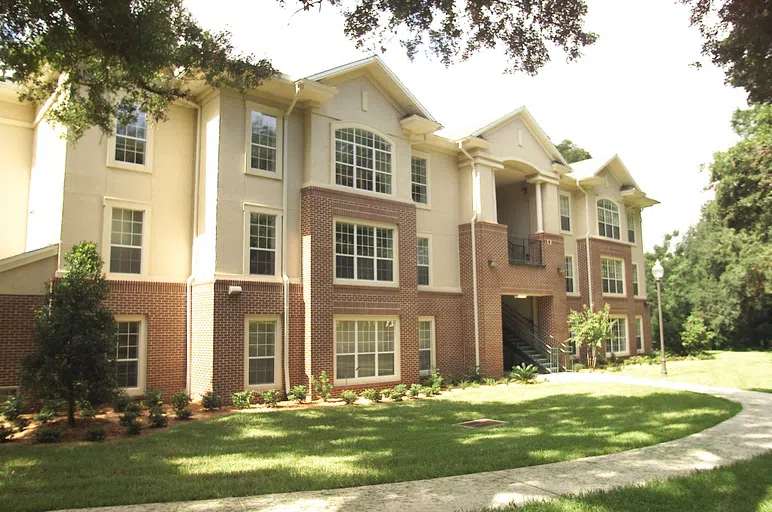 The outside of the Village Apartments.