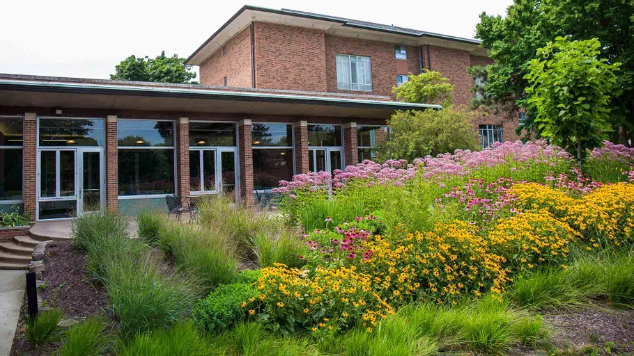 Flowers bloom outside Post Hall.