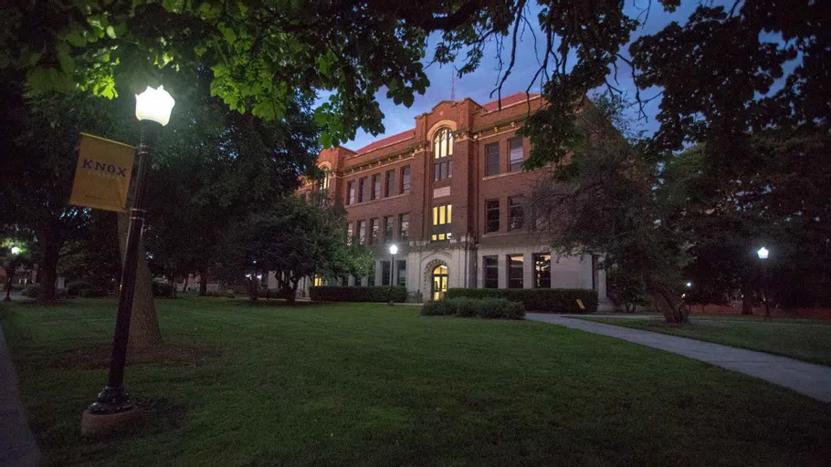 The Exterior of George Davis Hall on a summer evening.