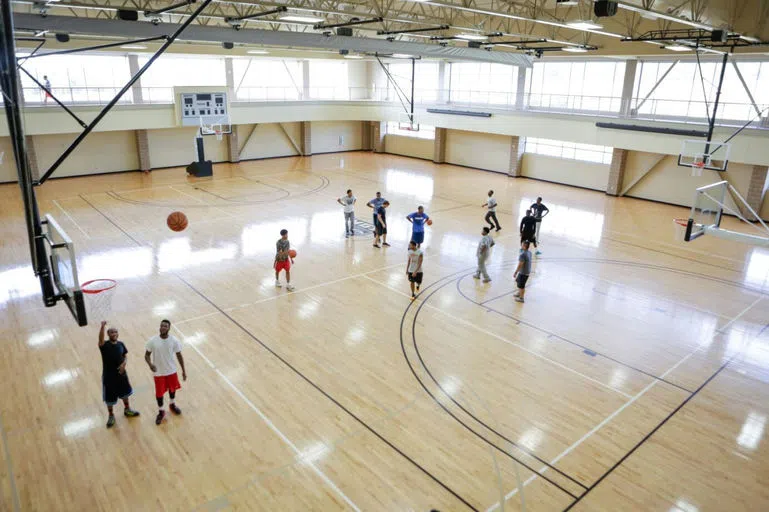 Students playing basketball inside RWC