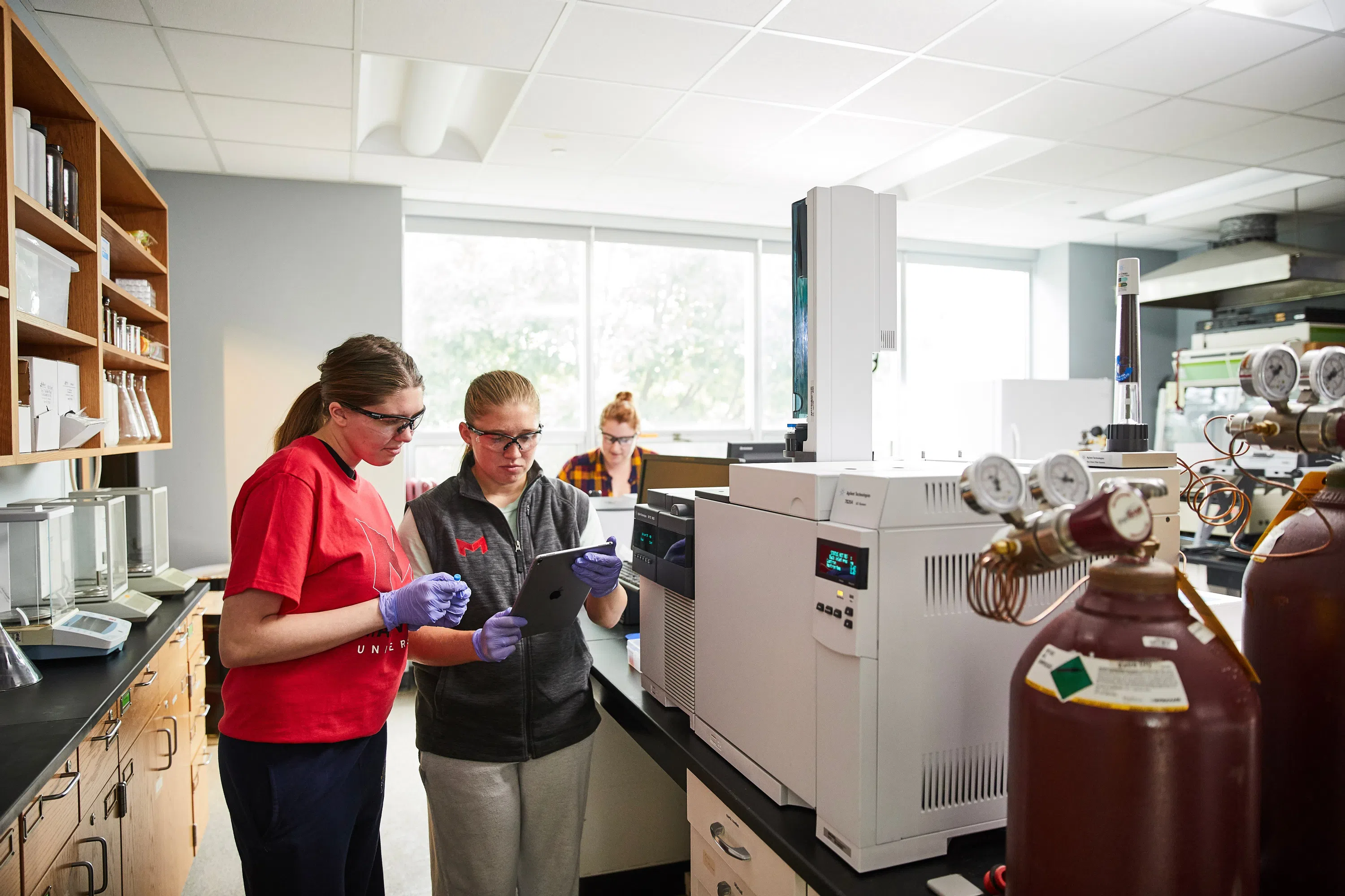 Students use the mass spectrometer in Kernaghan Hall.