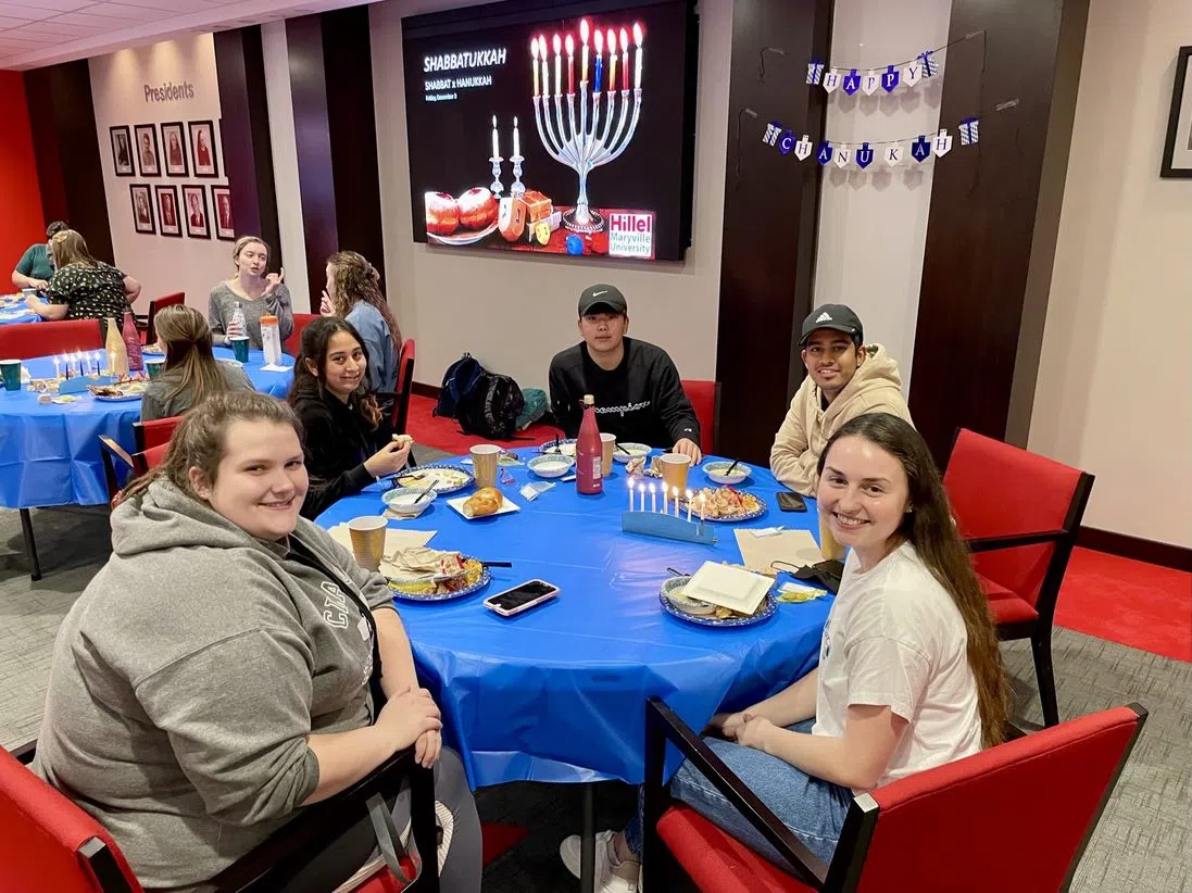 Students celebrate Shabbatukkah, a combination of Shabbat and Hanukkah, in the President's Conference Center. 