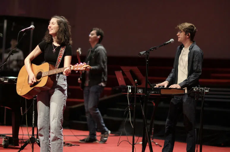 Students leading worship at chapel.