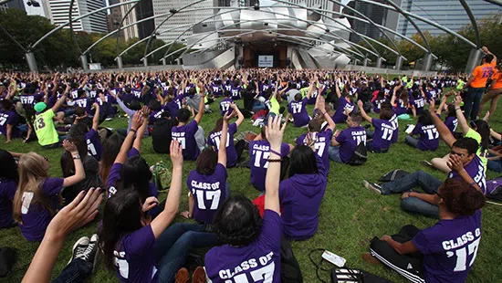 Northwestern students seated in Grant Park