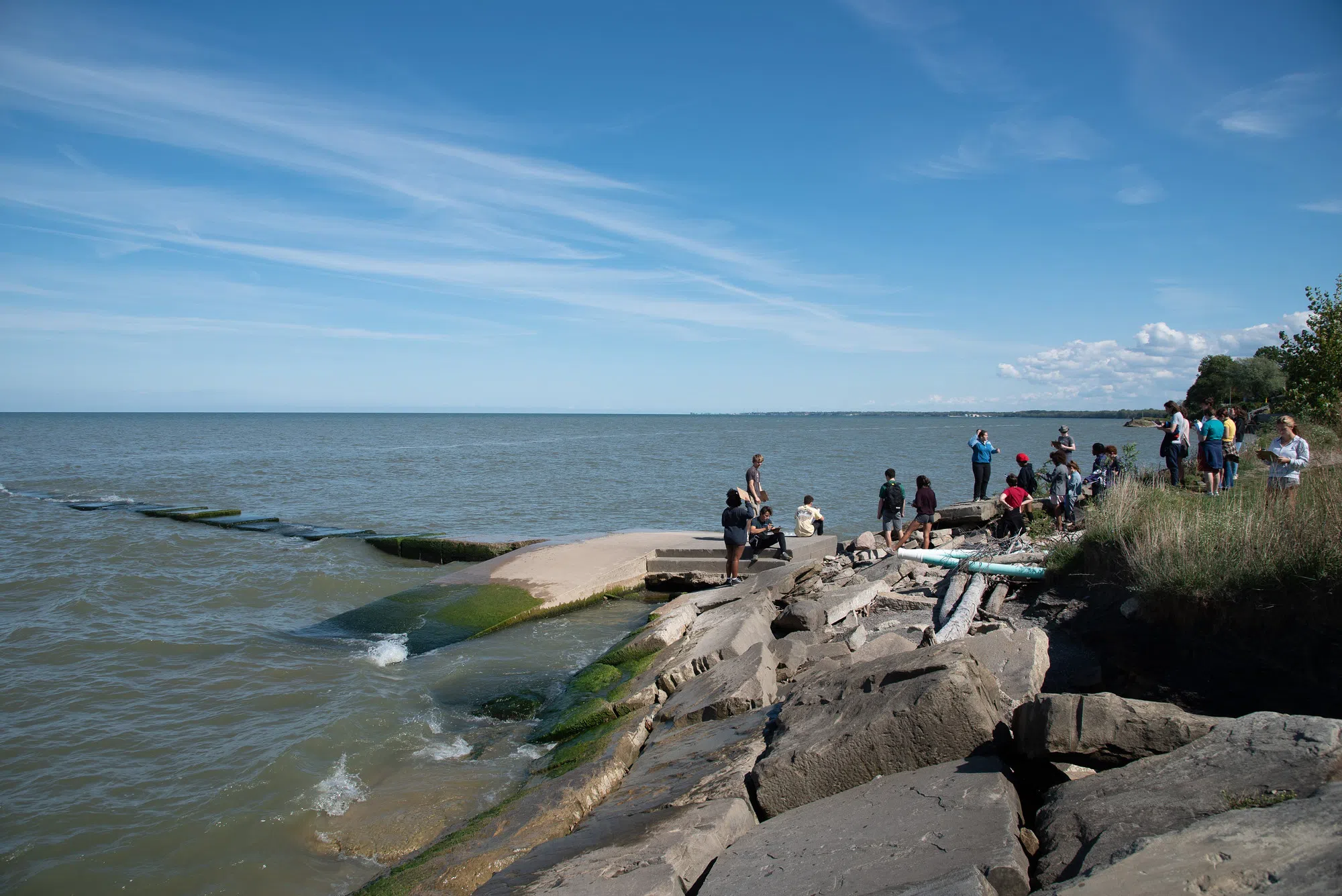 A group of students are pictured on the shores of Lake Erie, about a 30 minute drive from Oberlin's campus.