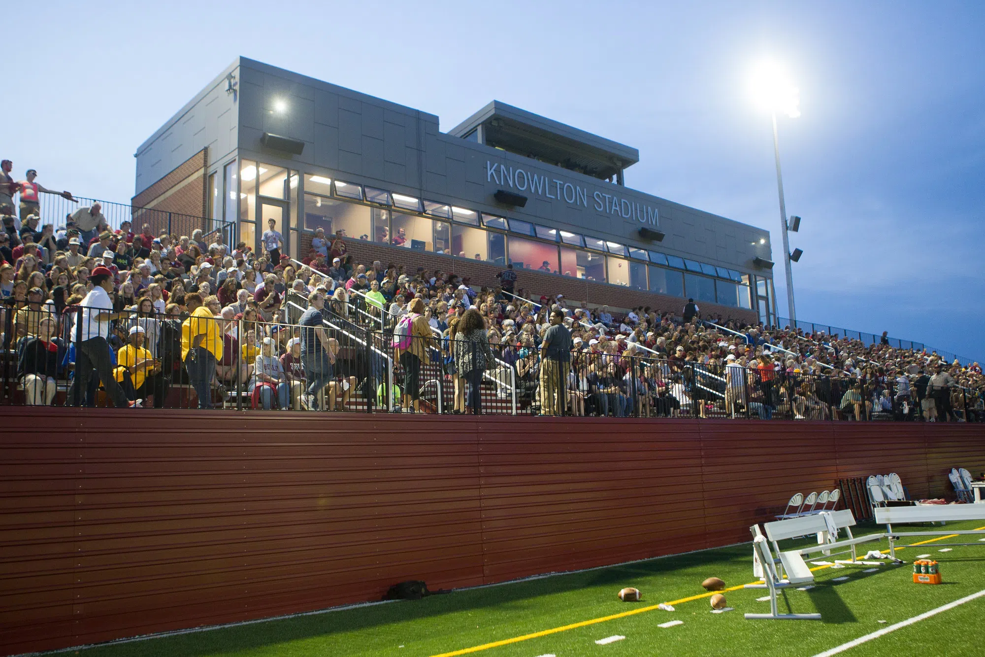 Knowlton stadium is full of fans on a fall evening. 