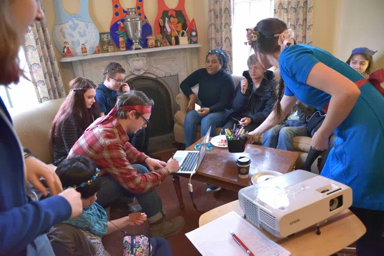 Students playing games in the lobby of Russian House