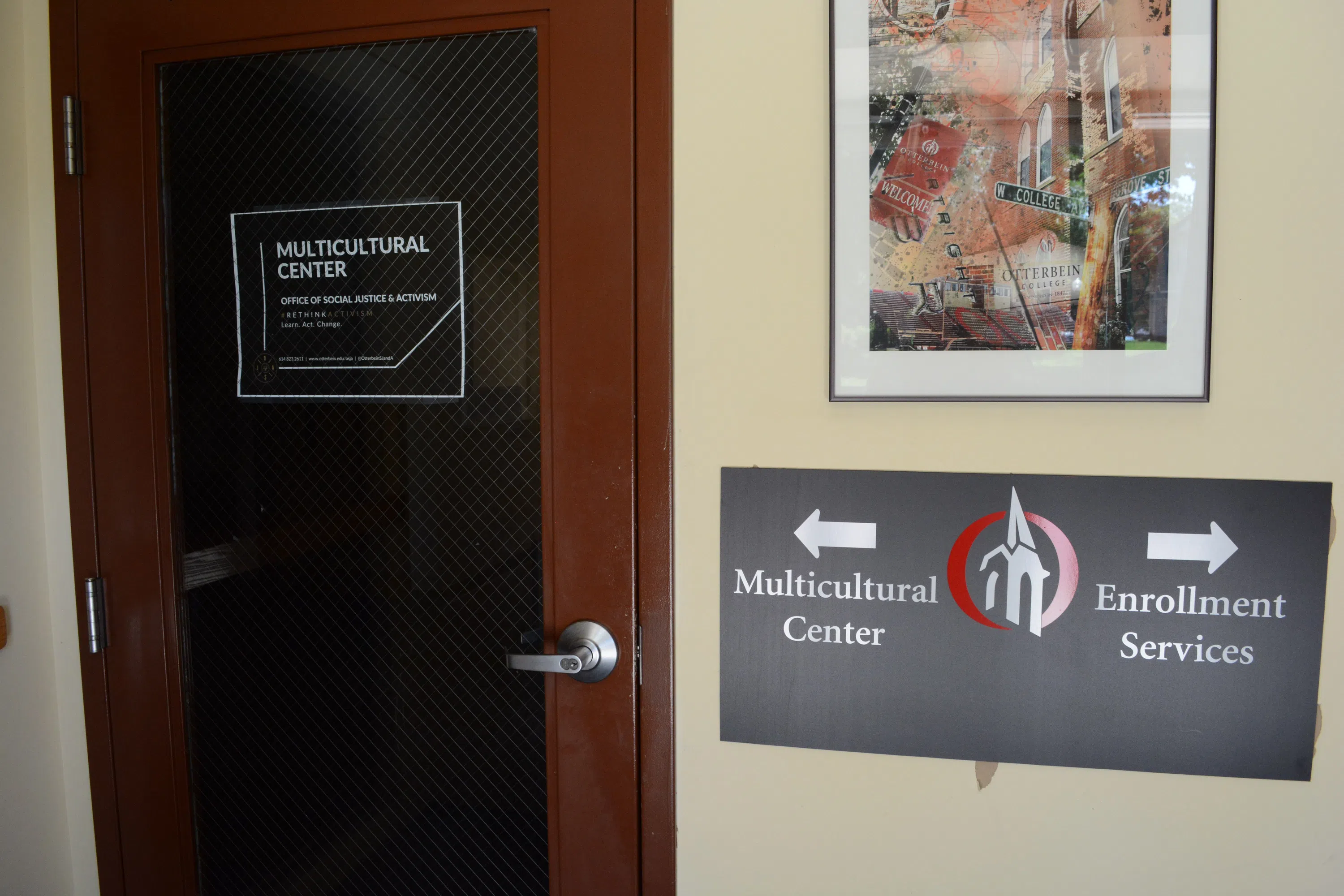 An view inside the Barlow Hall vestibule shows the front door of the Office of Social Justice & Activism.