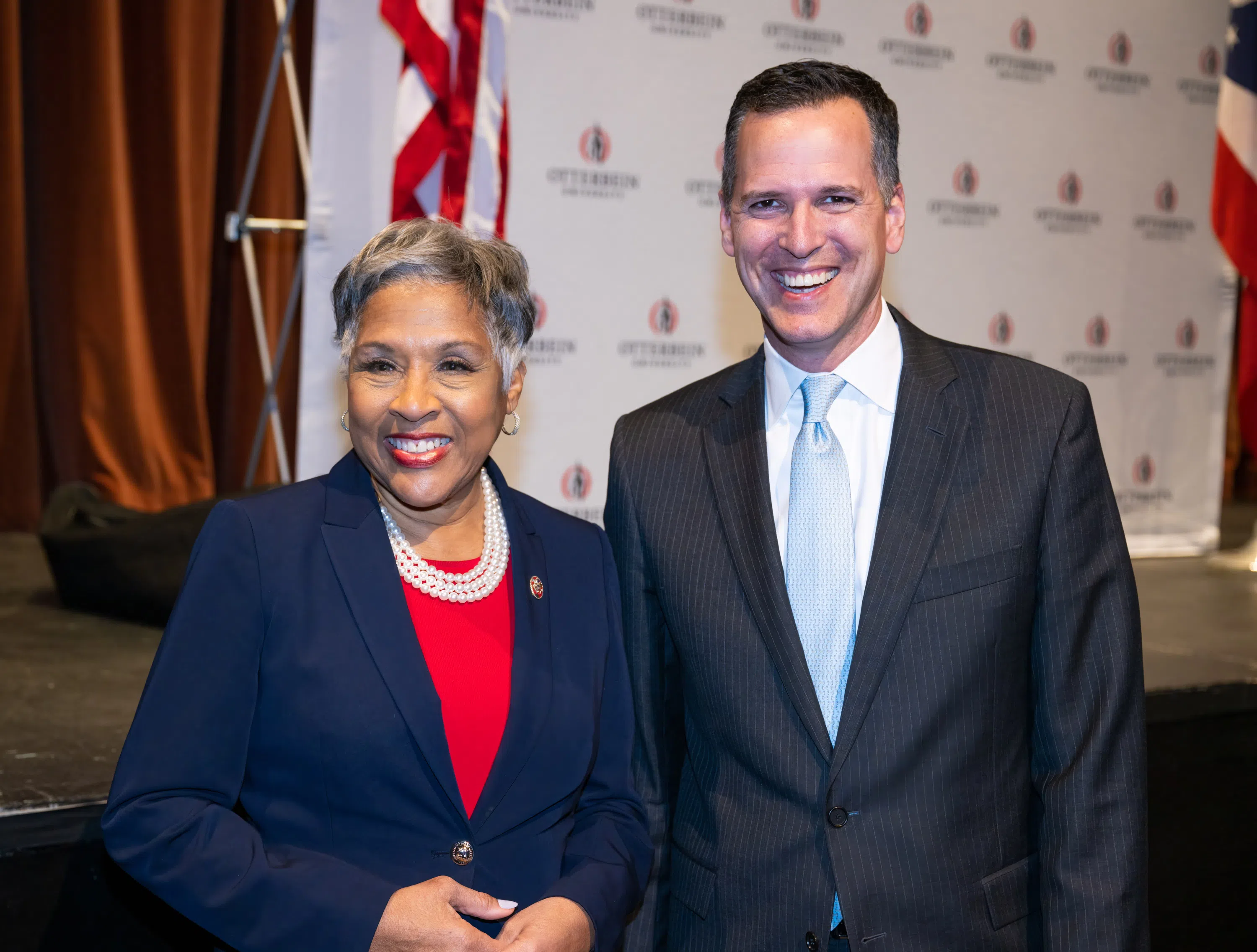 Joyce Beatty and President John Comerford smiling for a photo