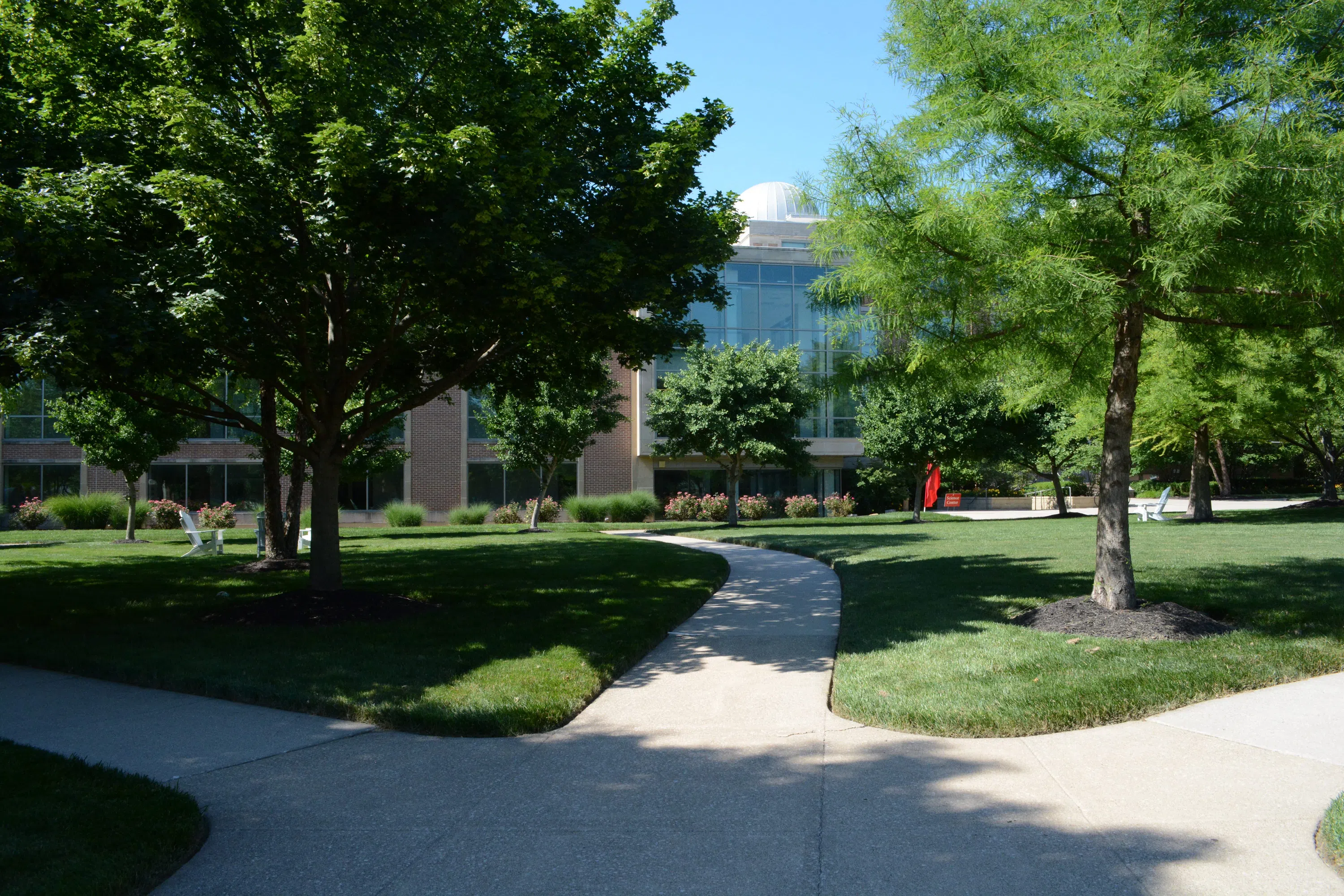 View from a green area of campus between Battelle Hall (Music), The Shear-McFadden Science Center, and Towers Hall.