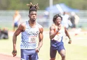 PGCC Track and Field athletes running on track