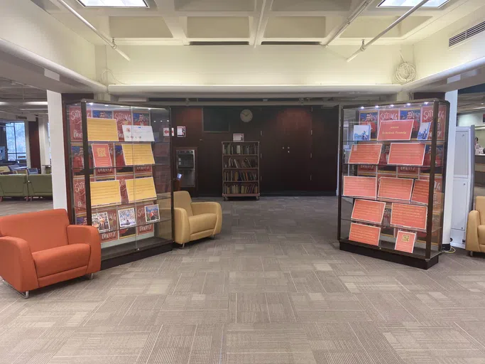 The lobby contains signage for a featured author.