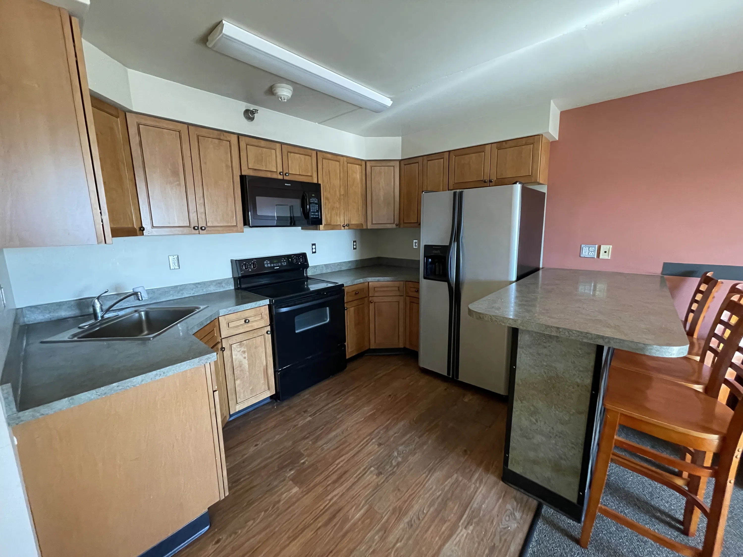 The 215 Apartments feature a full kitchen.