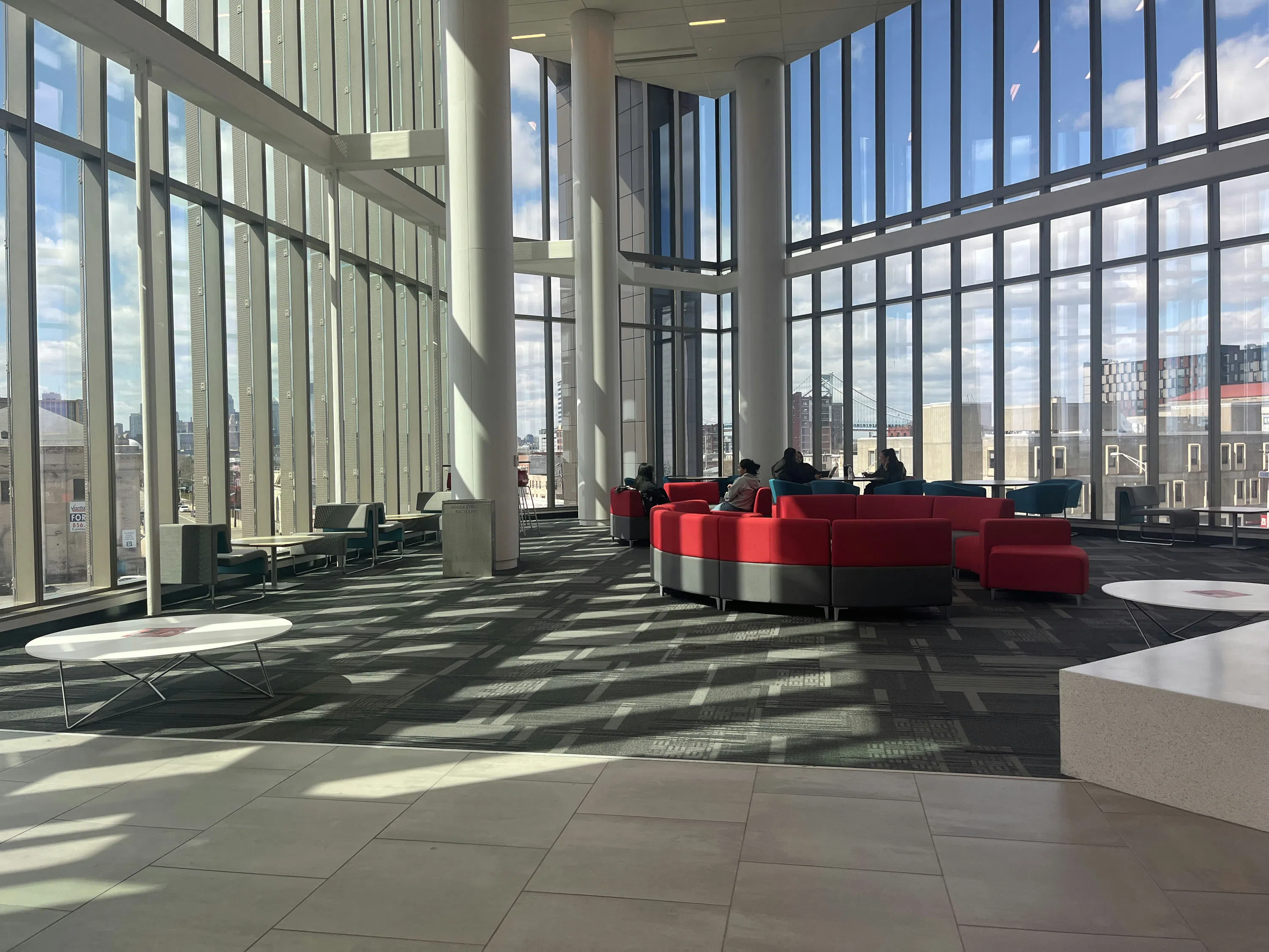 Tall glass windows adorn the lobby.