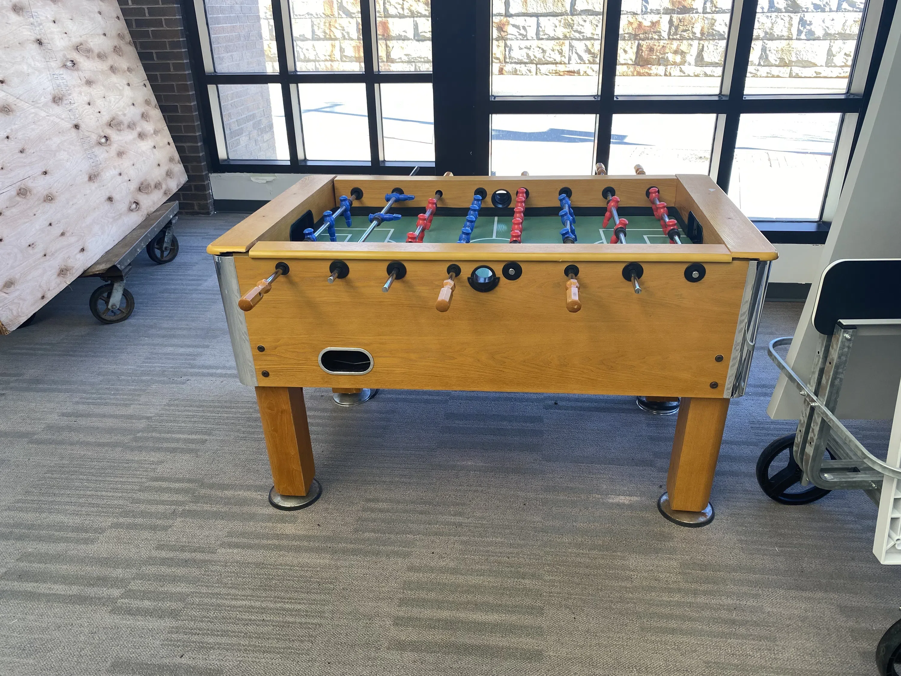 A foosball table is located in the fitness center.