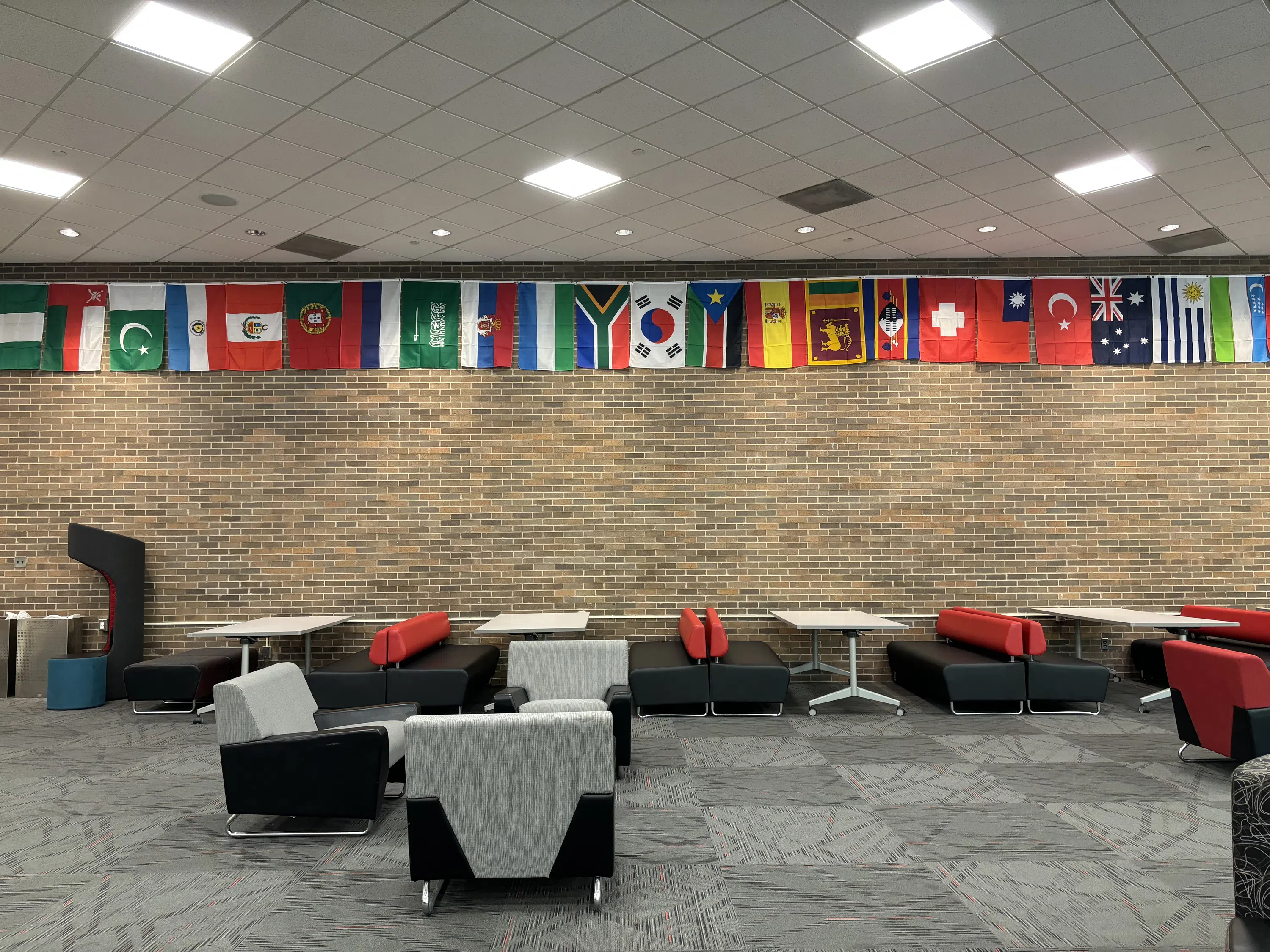 The Scarlet Lounge features plenty of seating and charging stations.