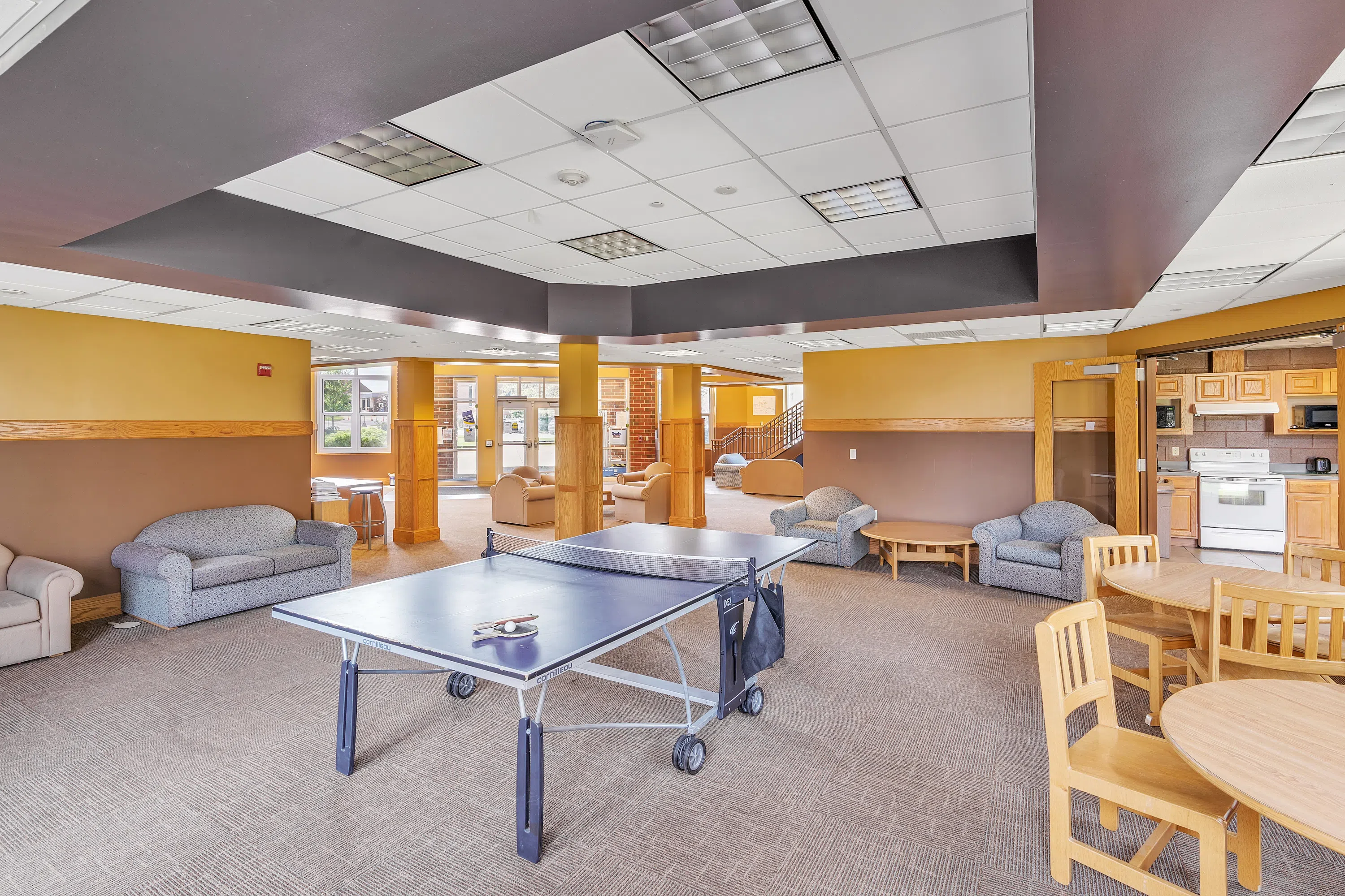 Community and lounge space with ping pong table in Gainey Hall.