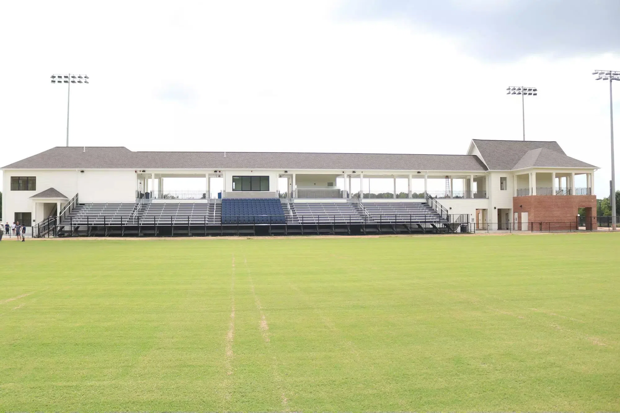 The grass field at the stadium.