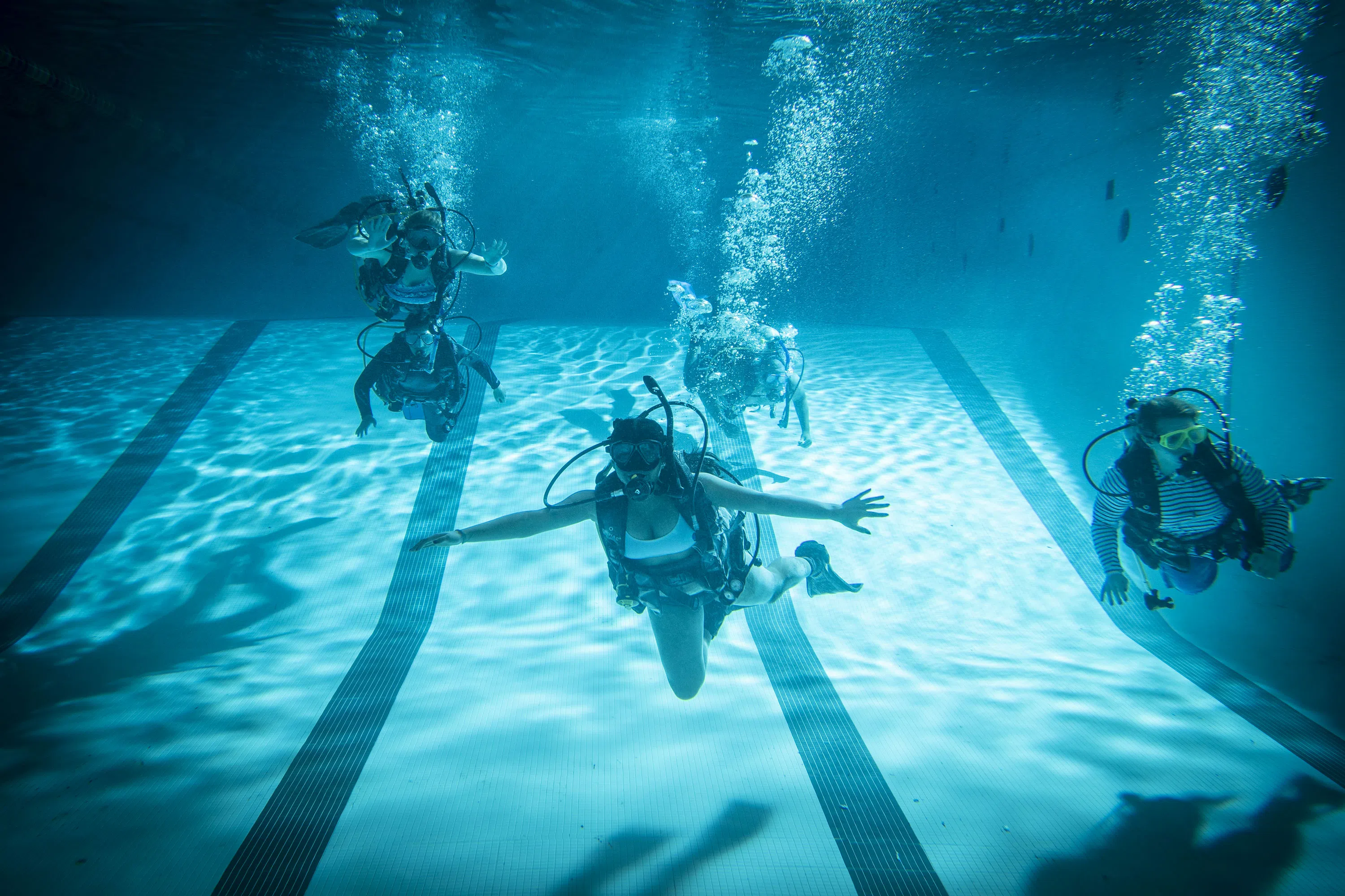 Students scuba diving in the ARC