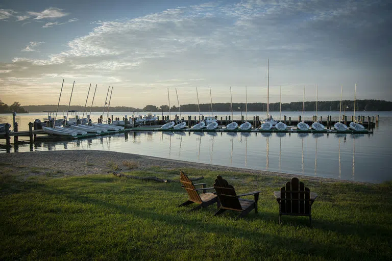 Waterfront next to campus with a marina and boats