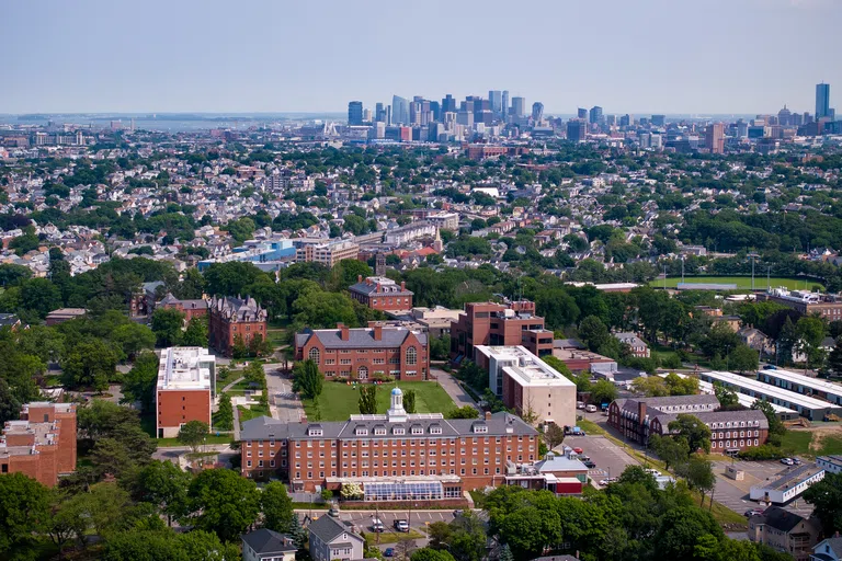 An aerial photo of Tufts University's Medford/Somerville campus, looking south towards Boston