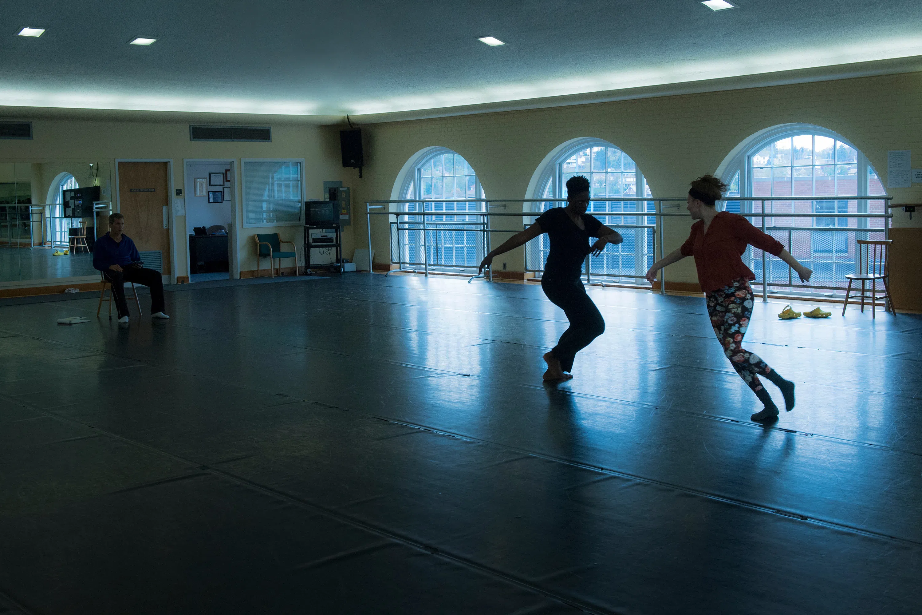 Students dancing in the dance studio inside of Elizabeth Moore Hall 