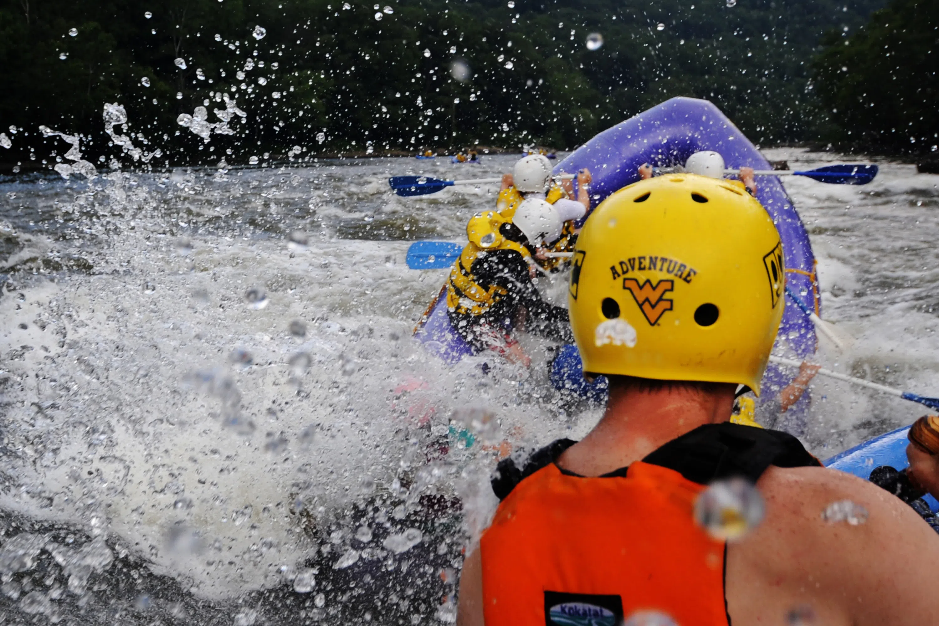 A group of WVU students fight the rapids on a white water rafting trip. 