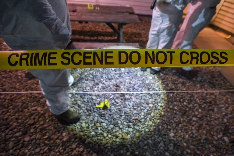 Photo of Crime Scene Tape saying "Crime Scene Do Not Cross" 