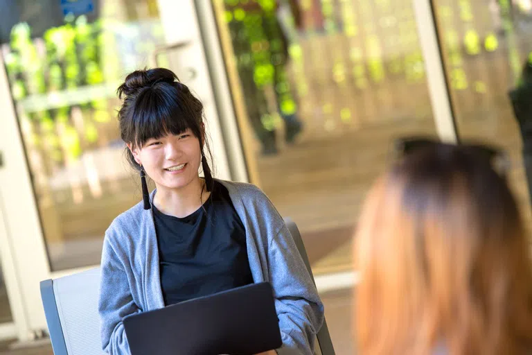 Asian students studying together