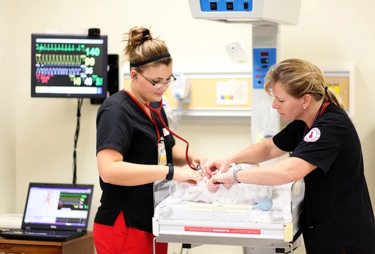 Students working in nursing program