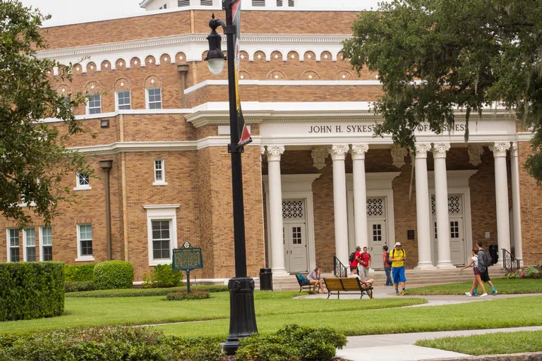 Students outside of the Sykes College of Business.