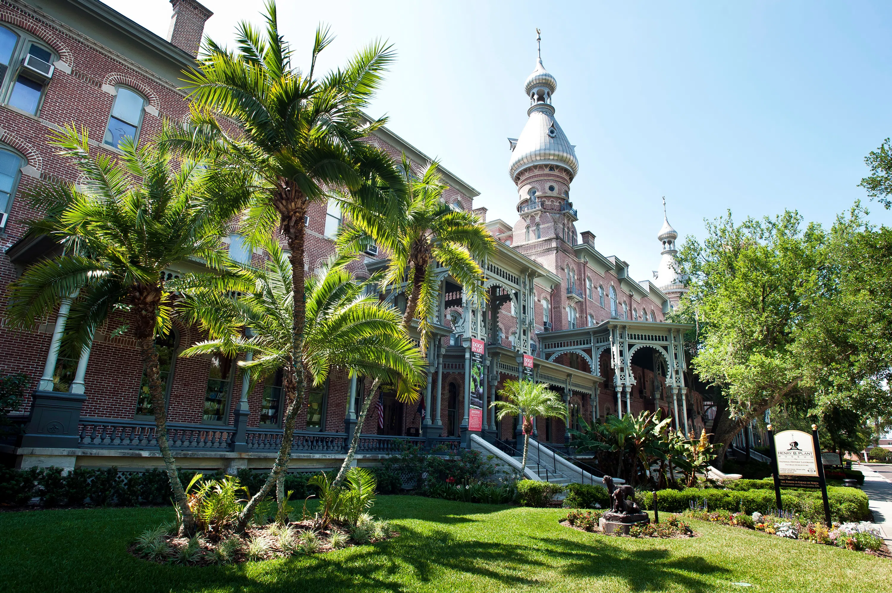 Exterior of Plant Hall surrounded by palm trees.