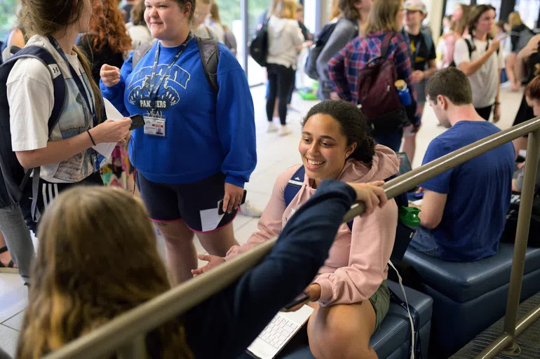 Honors students sit and chat