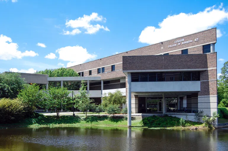 The front exterior of Coggin College of Business