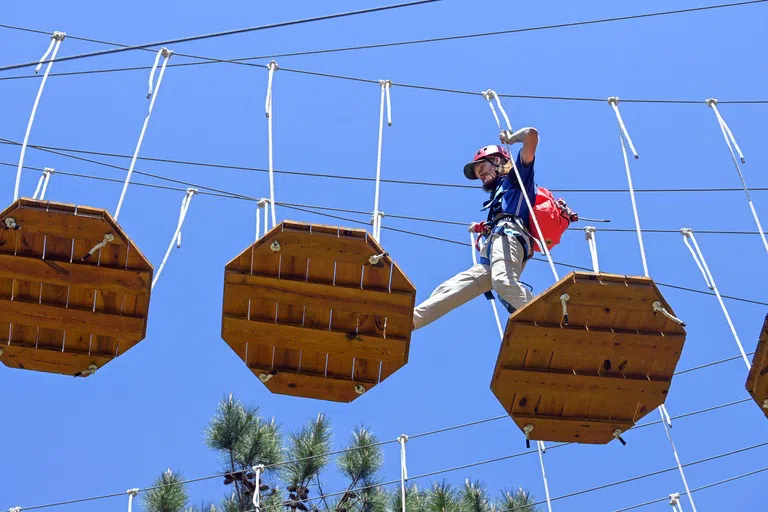 Student on Eco Adventure Skypark obstacle