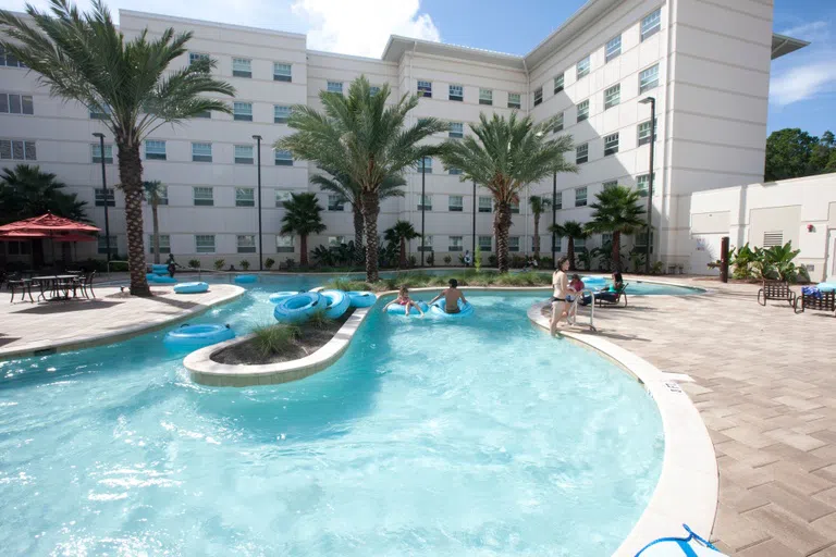 Students floating in the Osprey Fountains lazy river