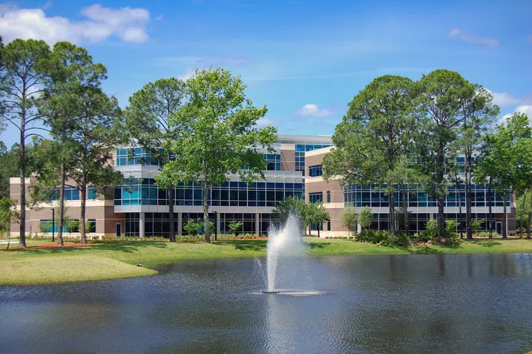 Front exterior of Tom and Betty Petway Hall and Boathouse Lake