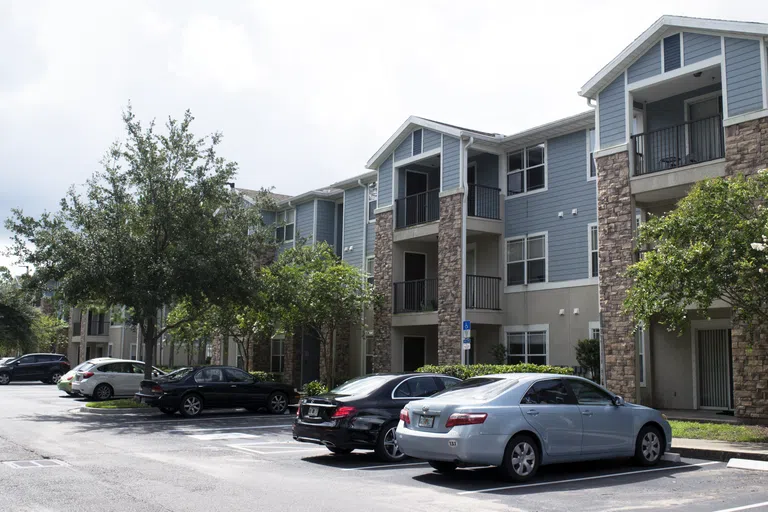 Cars parked outside of The Flats at UNF