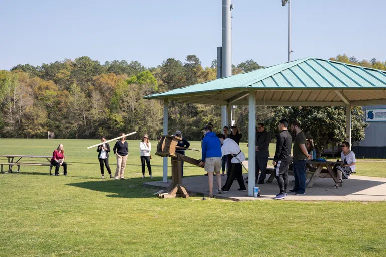 UWF History students showcased their knowledge of Ancient Rome through presentations and demonstrations, including siege weapons such as this onager built by engineering students, during the Daily Life in Ancient Rome event.